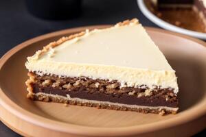 Vanilla slice. Delicious chocolate cheesecake with cup of coffee on wooden table. photo