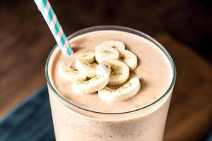 A glass of milkshake with whipped cream and blackberries.Strawberry milkshake, Raspberry milkshake. photo