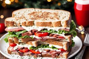 Sandwich with bacon, cheese, tomato and lettuce on wooden table photo