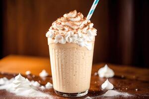 A glass of milkshake with whipped cream and blackberries.Strawberry milkshake, Raspberry milkshake. photo