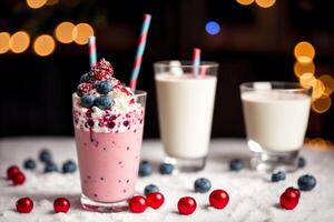 A glass of milkshake with whipped cream and blackberries.Strawberry milkshake, Raspberry milkshake. photo