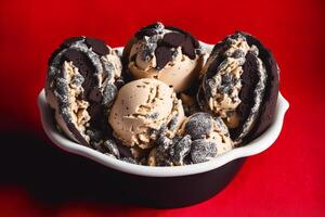 delicious Homemade ice cream with chocolate chips in a bowl on a wooden table. sweet food. photo