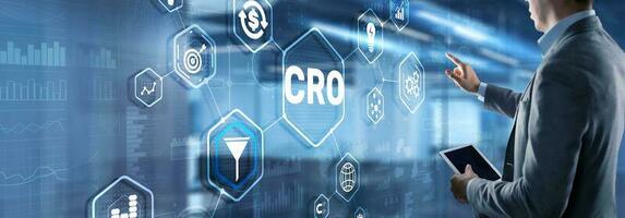 Conversion Rate Optimization. CRO Technology Finance concept Businessman pressing on a virtual screen photo