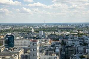 landscape of the city of Warsaw from the vantage point in the Palace of Culture on a warm summer sunny day photo