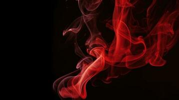 Red smoke on black background. Abstract colorful smoke on black background. photo