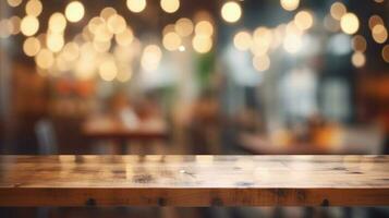 Empty wooden table in front of abstract bokeh light background. photo