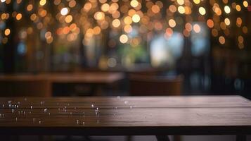 Empty wooden table in front of abstract bokeh light background. photo