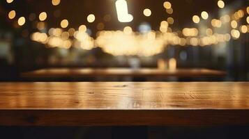 Empty wooden table in front of abstract bokeh light background. photo