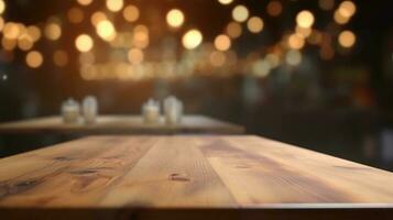 Empty wooden table in front of abstract bokeh light background. photo