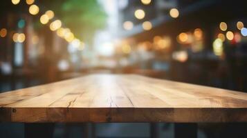 Empty wooden table in front of abstract bokeh light background. photo