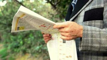 Businessman reading newspaper video