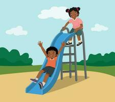 Cute little African kids boy and girl having fun on slide in playground at the park vector