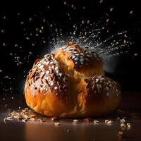 Fresh bread with raisins and flying flour on a black background, Image photo