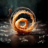 Fried onion rings on a black background with fire and smoke. photo