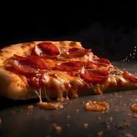 Pizza with flying ingredients on a black background. Shallow depth of field. photo