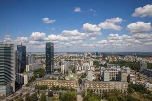 landscape of the city of Warsaw from the vantage point in the Palace of Culture on a warm summer sunny day photo