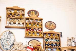 original soft delicate plush vintage toys displayed on shelves photo