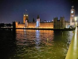 A view of the Houses of Parliament in London at night photo