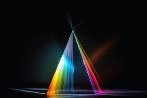 A prism dividing a lightbeam into the spectral colors created with technology. photo