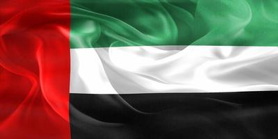 bandera de los emiratos árabes unidos - bandera de tela ondeante realista foto