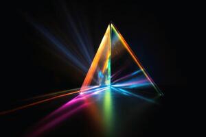 A prism dividing a lightbeam into the spectral colors created with technology. photo