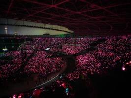 Defocused blurred photo of the atmosphere of blackpink's concert in Jakarta, Born in Pink.