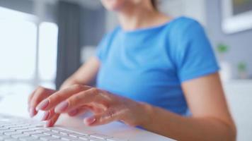 Female hands typing on a computer keyboard. Concept of remote work. Home Office video