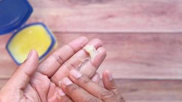 Close up of man hand using petroleum jelly video