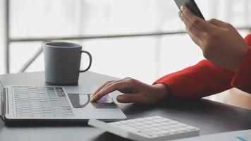 Financial analysts analyze business financial reports on a digital tablet planning investment project during a discussion at a meeting of corporate showing the results of their successful teamwork. video