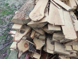 Boards cut into firewood for home heating photo