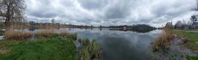 Panorama of the river in the village photo