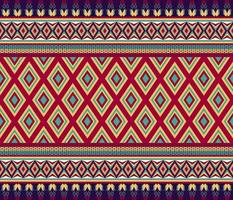 Colorful ethnic folk geometric seamless pattern in red, yellow and green in vector illustration design for fabric, mat, carpet, scarf, wrapping paper, tile and more