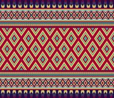 Colorful ethnic folk geometric seamless pattern in red, yellow and green in vector illustration design for fabric, mat, carpet, scarf, wrapping paper, tile and more