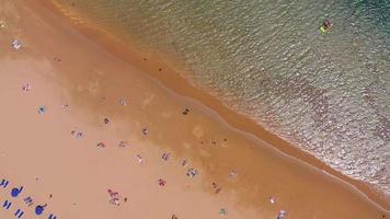 Top view of Las Teresitas beach, road, cars in the parking lot, golden sand beach, Atlantic Ocean. Paradise day at the beach. Tenerife, Canary Islands, Spain video