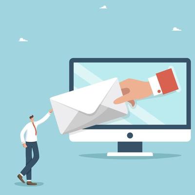 Communication by e-mail, newsletter and advertising about a product or service, working business correspondence of company employees, a large hand gives a letter to a man from a computer monitor.