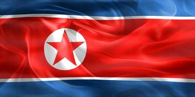 Ilustración 3d de una bandera de corea del norte - bandera de tela ondeante realista foto