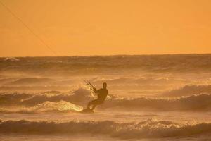 A man doing surf photo