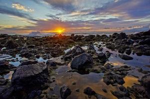 Sun Setting on the Atlantic Ocean in Tenerife Canary Island Spain photo