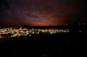 A cityscape at night photo