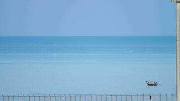 Longtail fisher boat near Mai Khao beach on Phuket Island, Thailand. video