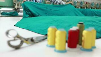 Tailor cutting fabric for sewing video