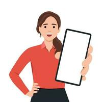 Cheerful beautiful young woman raised her hand to show blank screen in mobile phone while standing. Flat vector