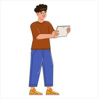 A happy young guy is holding a tablet computer in his hands and looking into it. A man standing isolated on a white background. Vector illustration