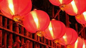 Close up red Chinese lantern is waving video