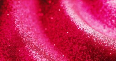 Wave of pink glitters as close up view from 3d rendering loop animation. video