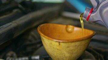 New Synthetic Oil Is Poured On The Car video