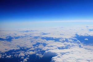 Aerial view of white cloud and blue sky. photo