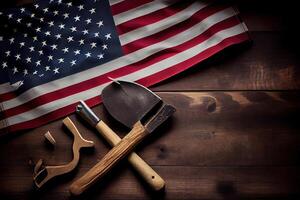 Happy Labor day concept. American flag with different construction tools. photo