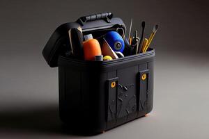 Plastic Black Container With Many Tools. photo