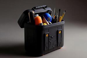 Plastic Black Container With Many Tools. photo